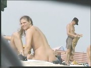 Helping Hand at the Nudist Beach