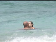 Here's my lovely wife again taking in some waves and sun at a local nude beach. I hope you enjoy.