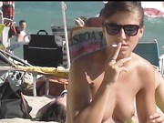 Cute teen topless at the beach