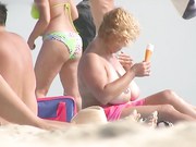 Shameless nudists make fun on the beach