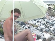 Wife Jerks Off Nude Beach Voyeur While Talking With Husband!