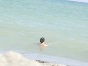 Wives Teasing Nude Beach Voyeurs   Gives One A Handjob!