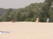 Two young nudist teens  Running at the beach