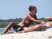 Voyeur blond teen grabbing his dick on nudist beach