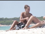 Voyeur blond teen grabbing his dick on nudist beach