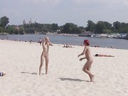 Nudist movie - Cute redhead stripped on beach