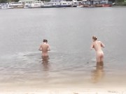 Two good friends enjoy the nude beach